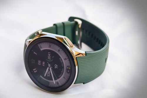 OnePlus Watch 2 Wear OS smartwatch green strap silver chrome dial