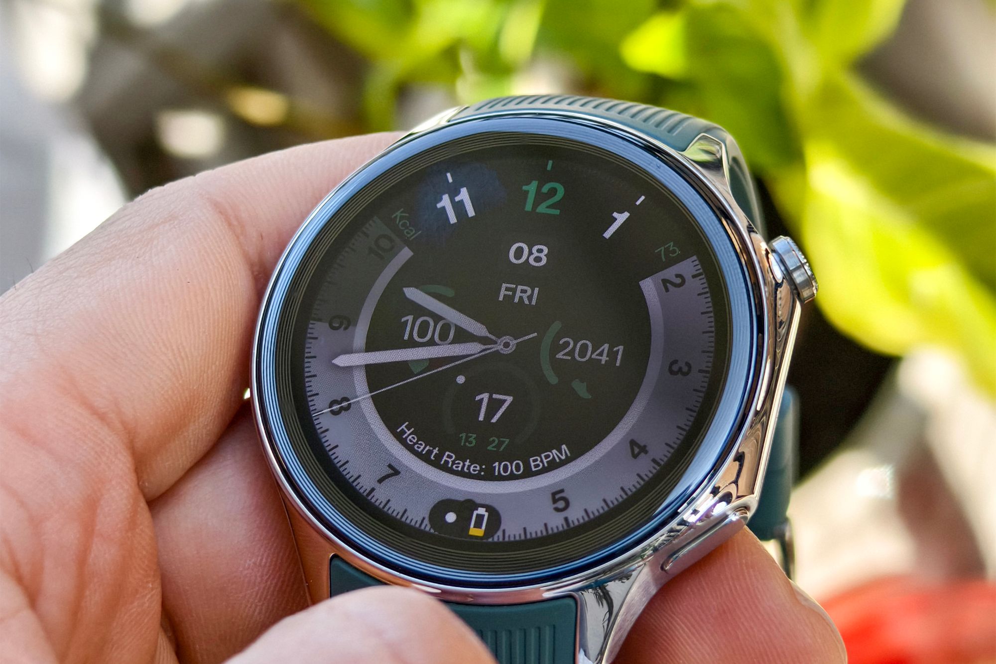 OnePlus Watch 2 Wear OS smartwatch with green rubber band
