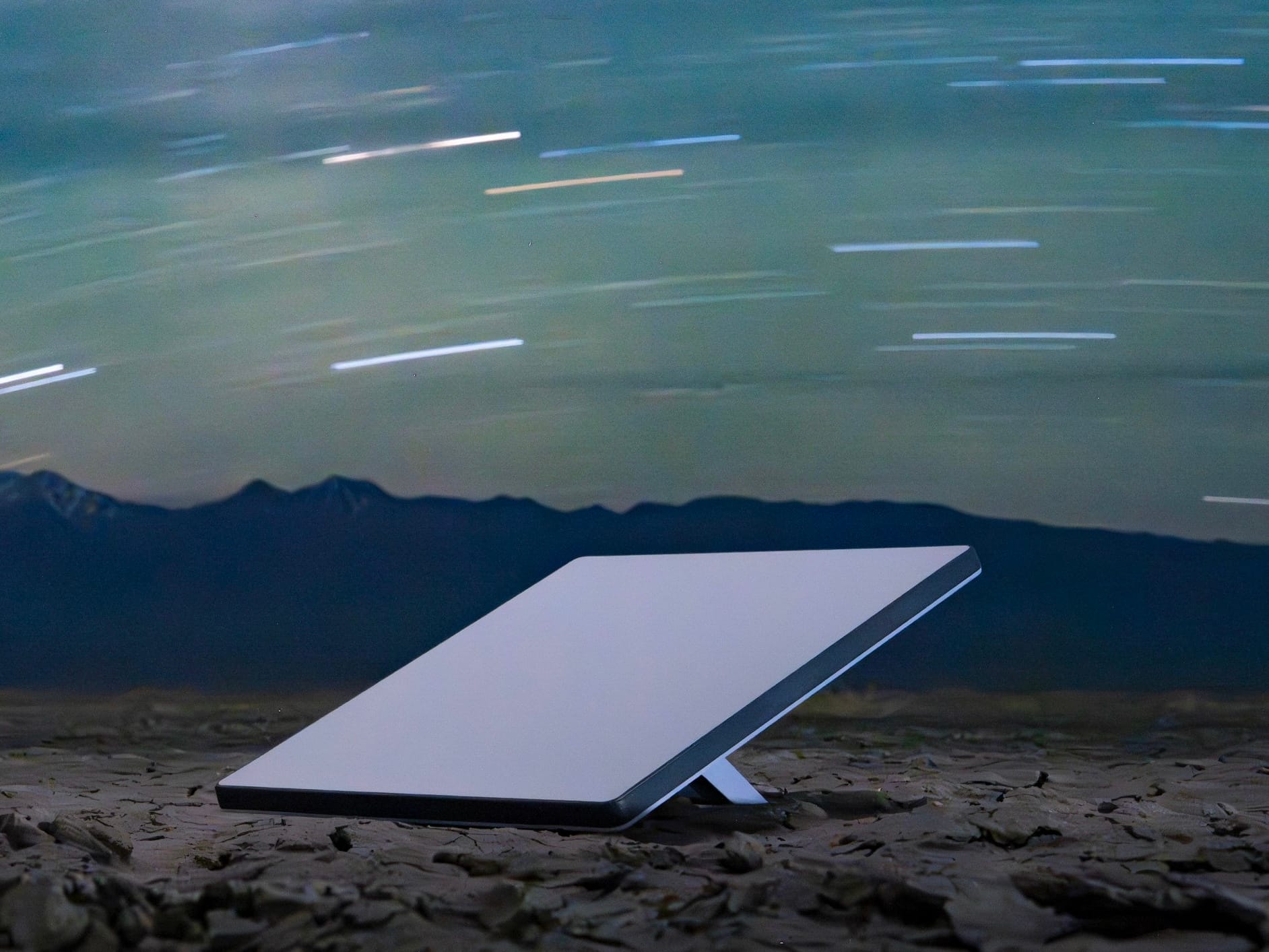 A Starlink receiver positioned at ground level.