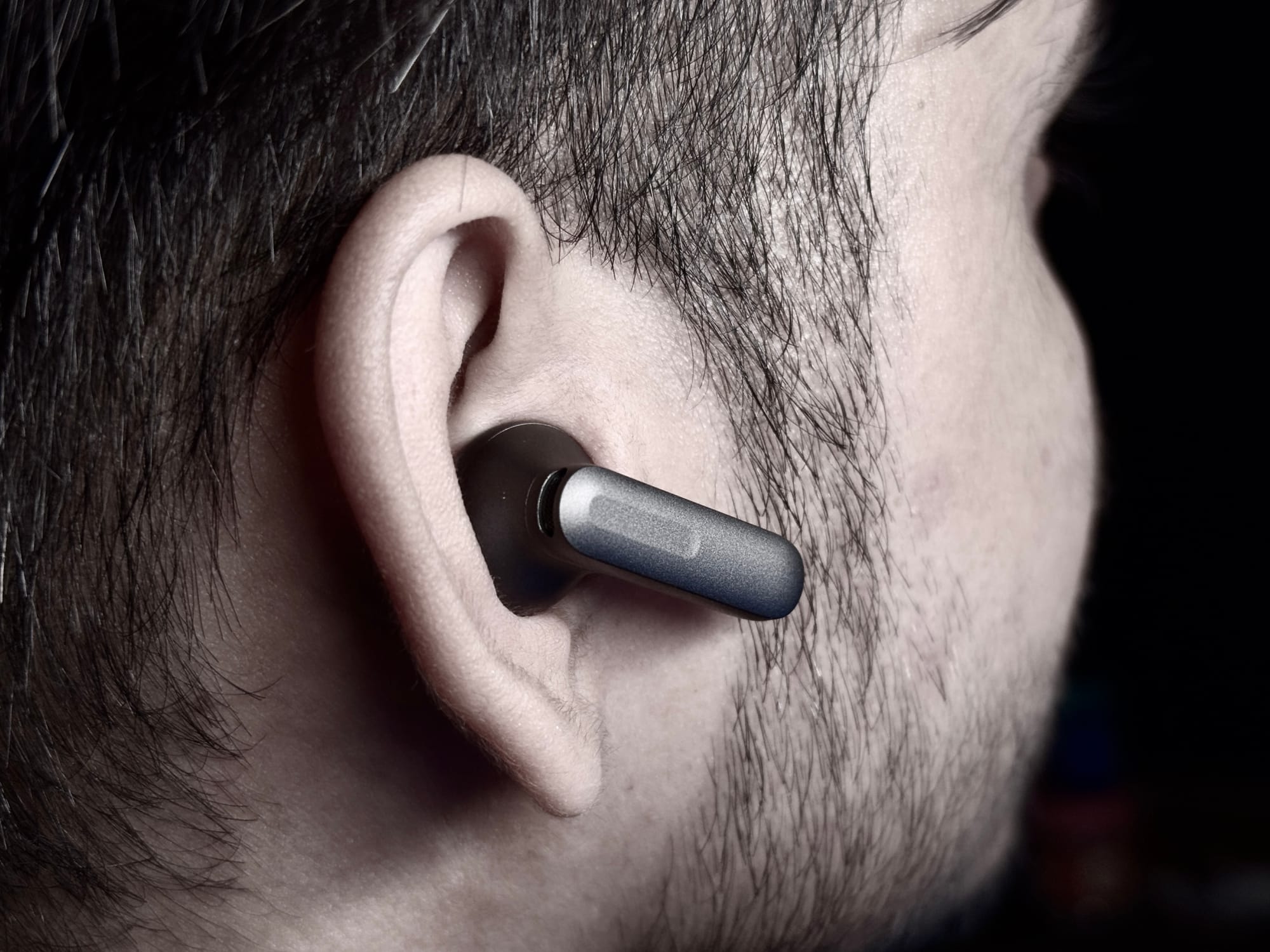 Person wearing OnePlus Buds 4.