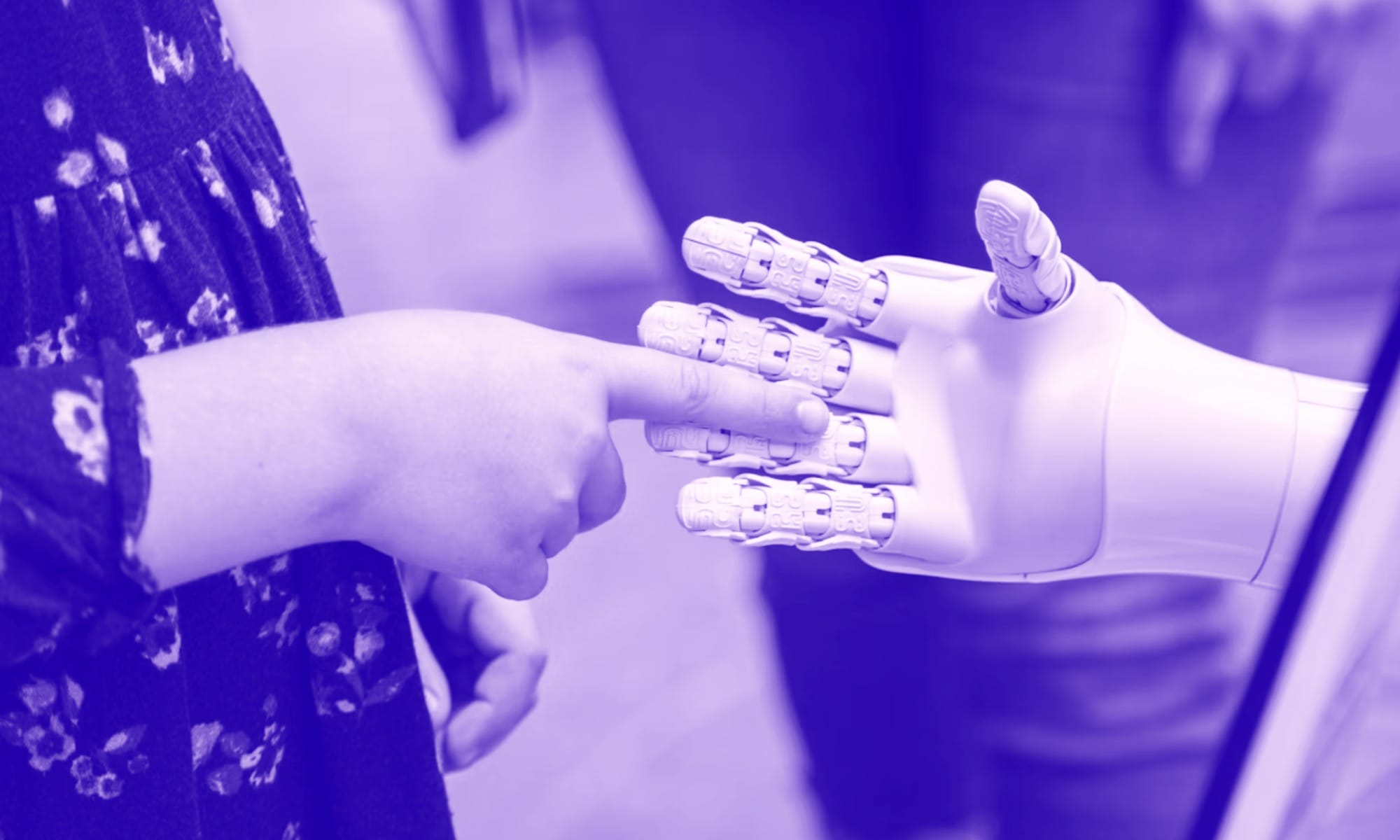 Human and robotic hands.