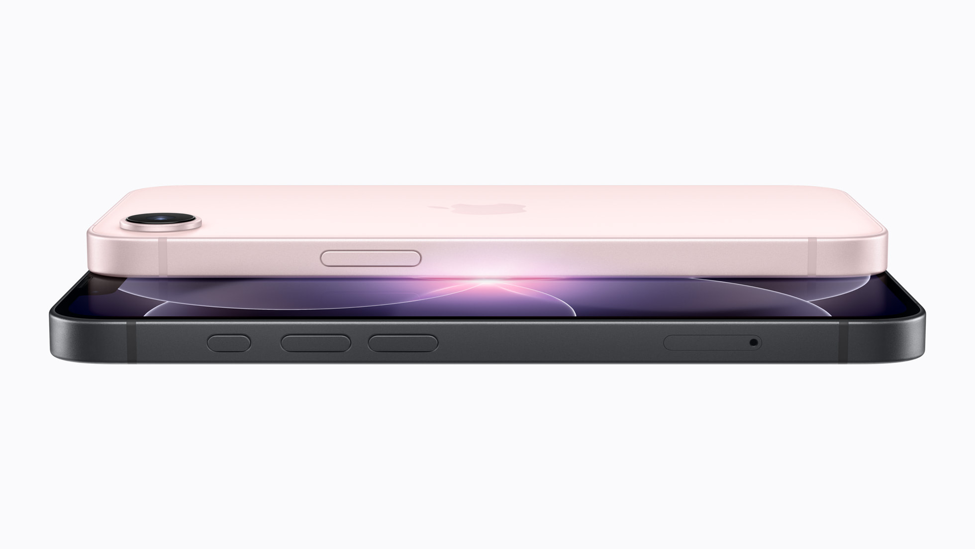 New iPhone 17e with Soft Pink colour on top with screen facing down and in Black in the bottom with screen facing up. Credit: Apple