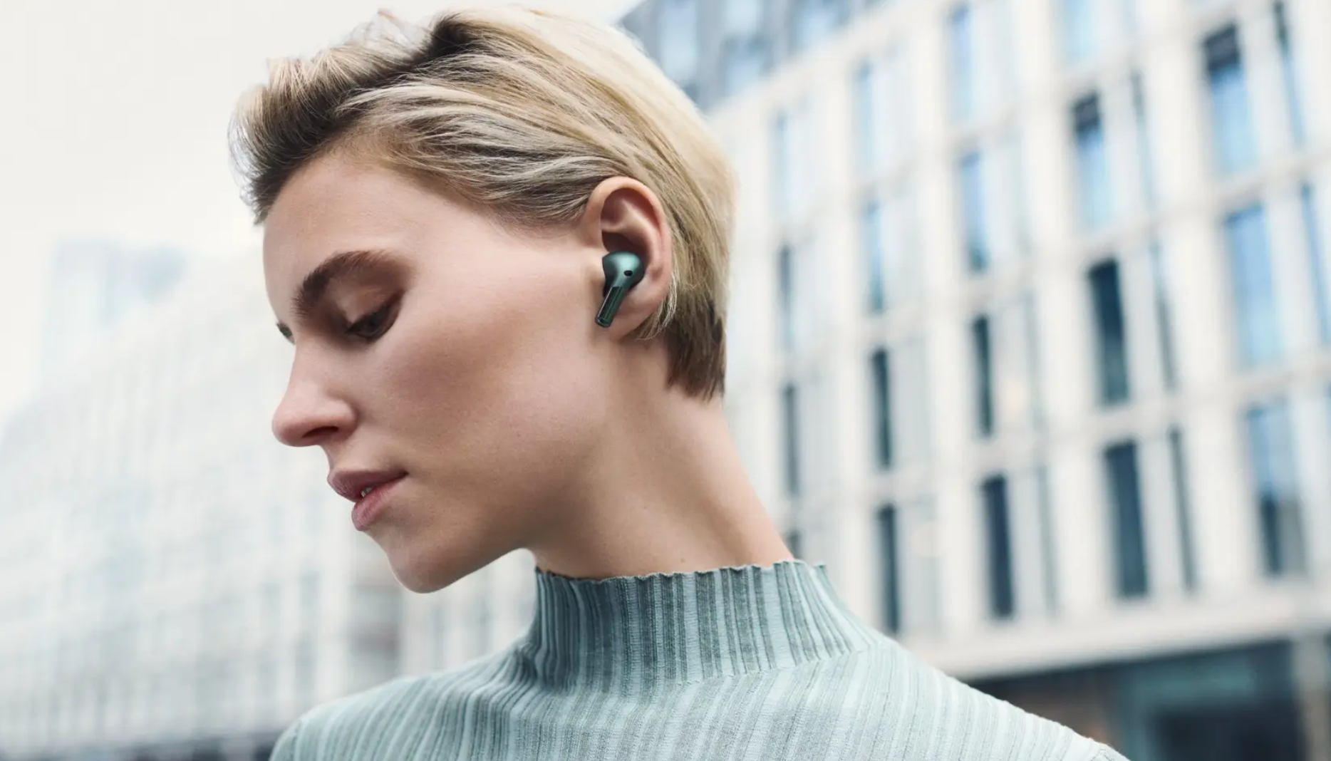 person listening to Oppo OnePlus Buds Pro 2 with spatial audio  